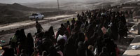 15iraquies huyendo de Mosul